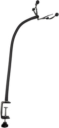 Grooming dryer hose holder attached to a grooming station