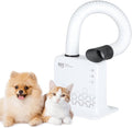 Low-noise hands-free pet grooming dryer on a stand drying a small dog