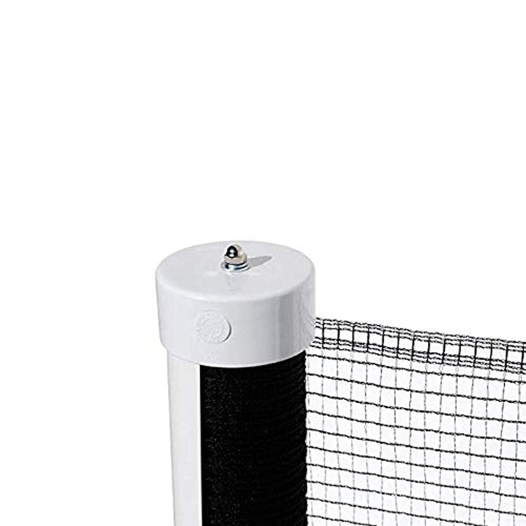 Black retractable driveway guard net stretched between two posts