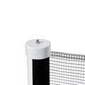 Black retractable driveway guard net stretched between two posts