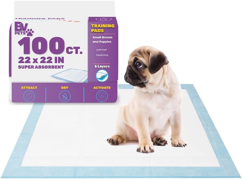 Stack of gray charcoal puppy training pads, one unfolded on the floor – view 4
