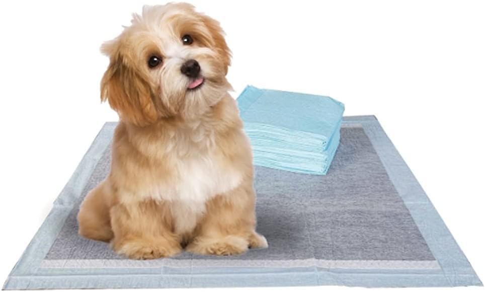 Stack of gray charcoal puppy training pads, one unfolded on the floor – view 5