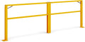 Yellow folding dock door safety gate with gas struts at a loading bay