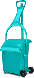 Long-handle pooper scooper with built-in waste bin on lawn