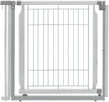 Wooden pet gate and kennel panel in a home