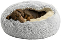 Grey plush hooded donut cave dog bed with raised rim