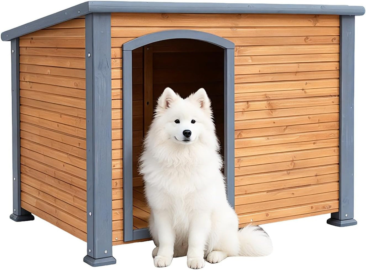 Wooden outdoor dog house with sloped asphalt roof and raised feet