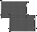 Black retractable mesh dog gate across a hallway