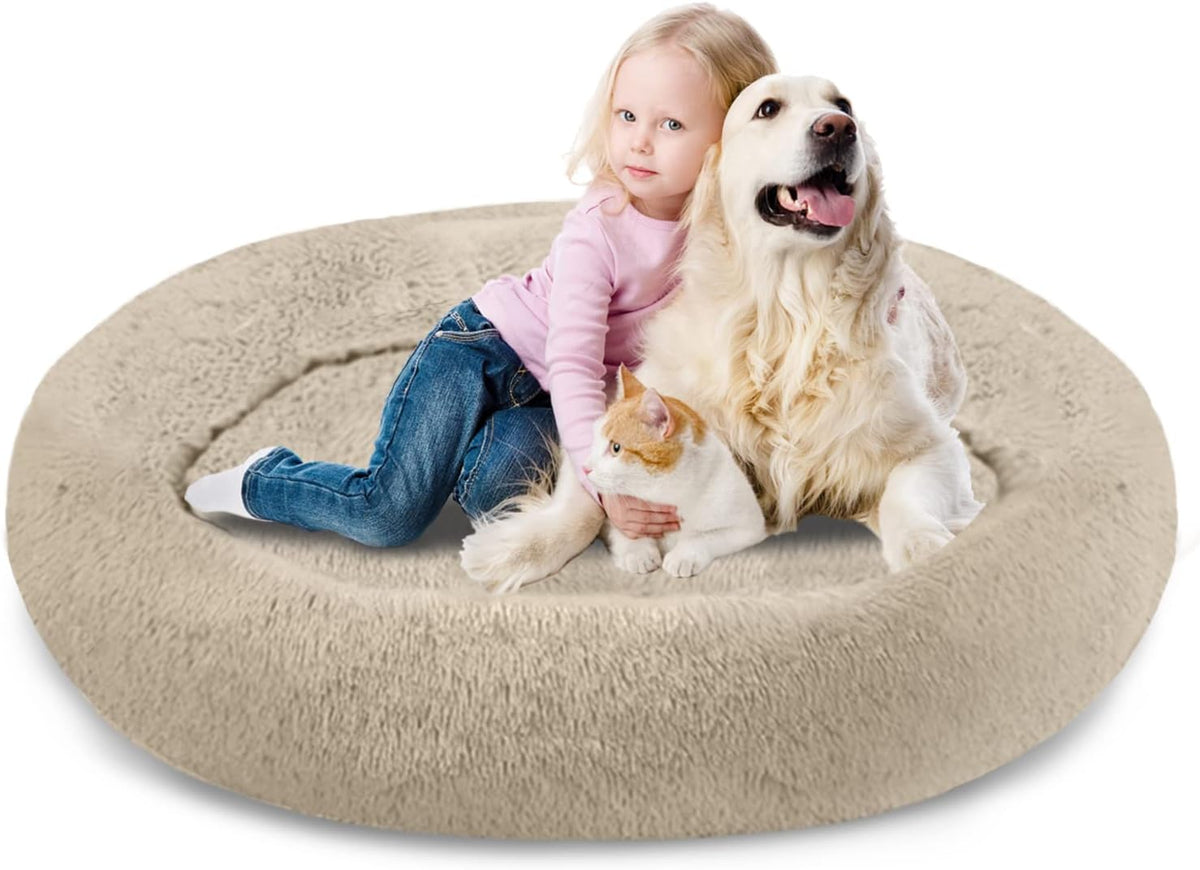 Beige round faux fur donut dog bed with raised plush rim