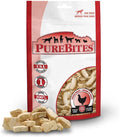 Bag of freeze-dried chicken breast dog treats with pieces scattered in front – view 10