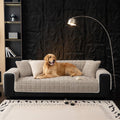 Grey corduroy flannel pet couch cover on a sofa