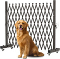 Brown expandable metal barricade on casters in a garage – view 2