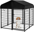 Outdoor welded wire dog kennel with fabric roof cover on grass