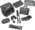 Black vented motorcycle pet carrier bag mounted on a seat