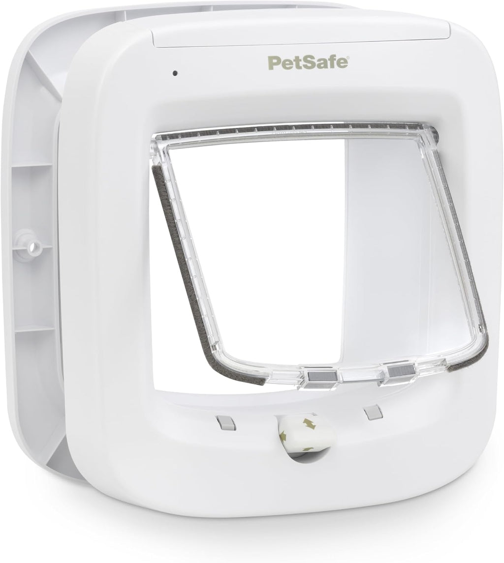 White microchip cat flap door with 4-way lock installed in a door