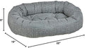 Small round donut dog bed with raised bolster ring in hampton woven fabric