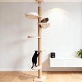 Floor-to-ceiling cat climbing pole with sisal post, plush bed and hammock