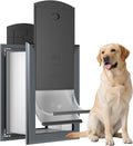 Heavy duty large dog door installed through an exterior wall with a dark flexible flap