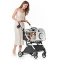 Pet stroller with clear hard-shell detachable carrier on a wheeled frame