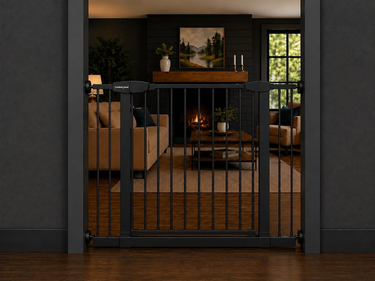 Black 36 inch pressure-mounted pet gate with walk-through door in a hallway