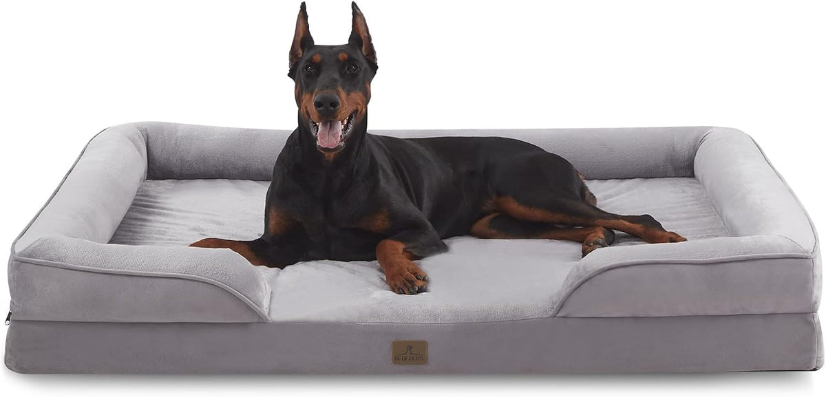 Light grey XXL orthopedic dog couch bed with bolsters and nonslip bottom