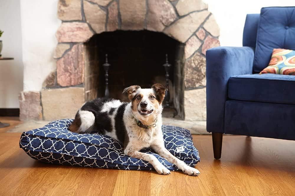 Gray wool-filled dog crate pad with organic cotton canvas cover