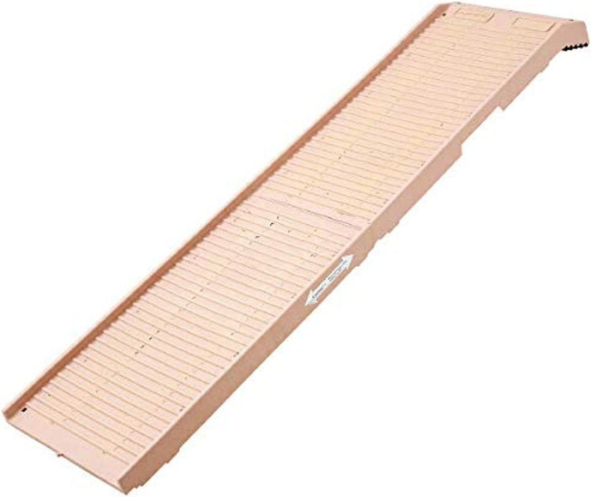 Folding dog ramp with ridged rubber surface leaning against an SUV cargo area
