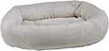 Small oval donut dog bed with removable tufted cushion in Aspen color
