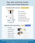 White rotating pet camera with treat dispenser on a living room shelf