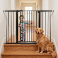Extra tall black walk-through pet gate with double-lock latch at top of stairs