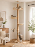 Minimalist floor to ceiling cat tree with clear bowl perch and hammock