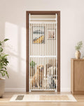 White floor to ceiling extra tall cat gate with narrow bars in a doorway