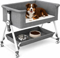 Elevated bedside pet bed extender positioned next to a human bed