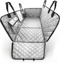 Gray hard bottom dog back seat extender creating a flat platform in an SUV