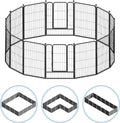 Foldable metal wire pet playpen with gate set up in a yard