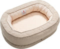 Beige oval orthopedic dog bed with raised bolster sides