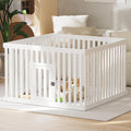 Black twelve-panel portable dog playpen with locking door set up on a lawn