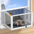 Grey window box catio with clear panels attached to a window
