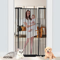 Black extra tall steel walk-through pet gate with narrow slats in a hallway doorway