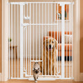 Extra tall 51 inch cat gate with small built-in cat door installed in a doorway