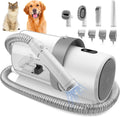 White and gray pet grooming vacuum with attachments and clipper combs