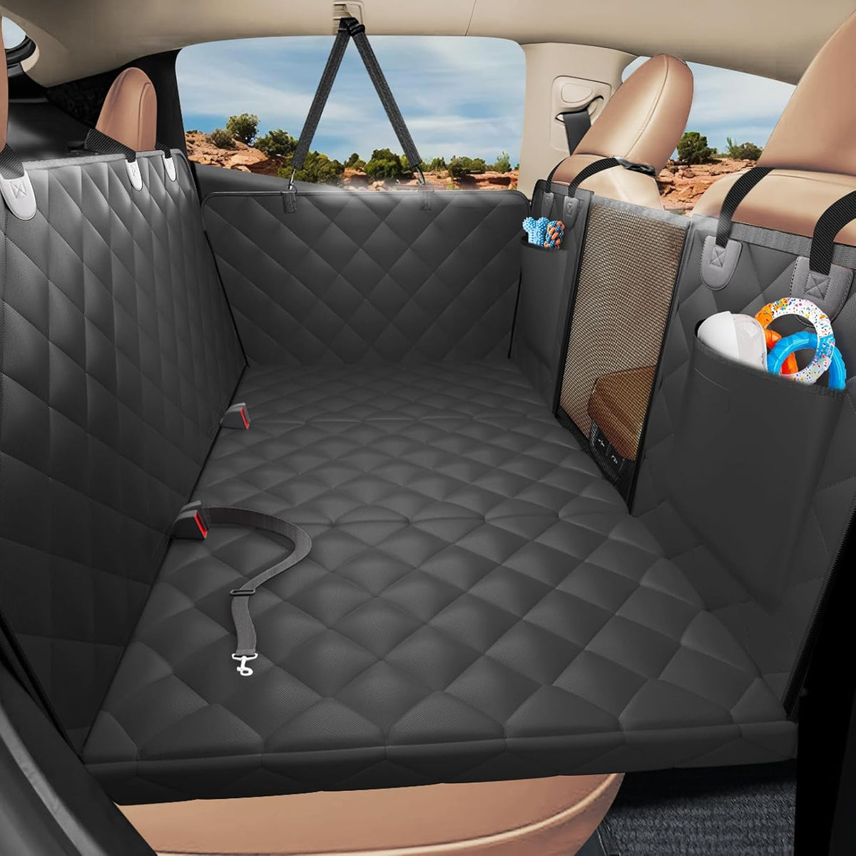 Hard bottom dog back seat extender with foam pad in a car