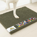 Army green chenille entryway mat on a hallway floor