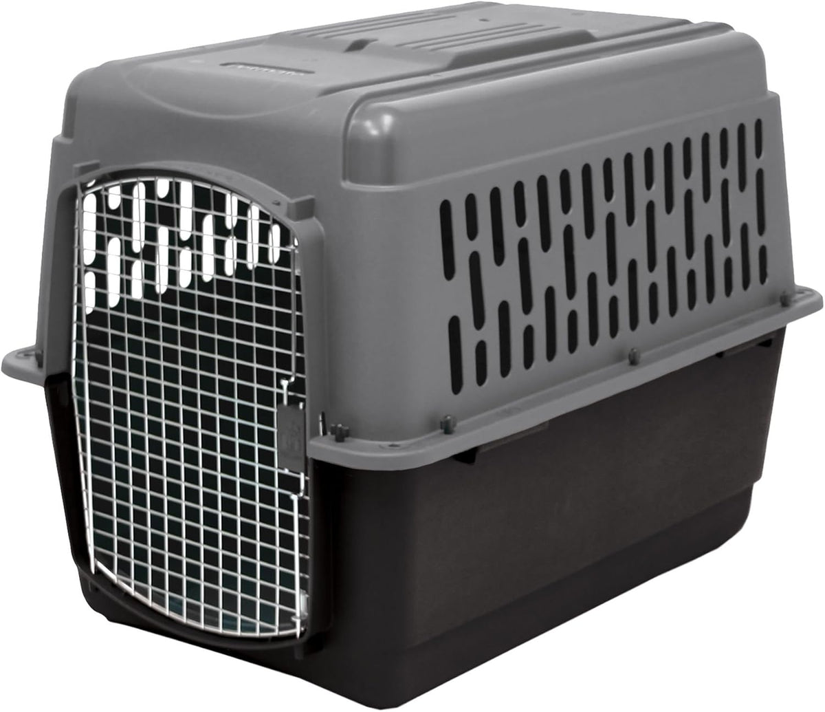 Dark gray and black plastic travel dog kennel with wire door