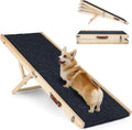 Folding wooden dog ramp with gray traction mat leaning against an SUV – view 2