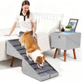 Dark grey wooden ottoman dog stairs with eight non-slip steps beside a couch