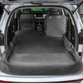 Black non-slip dog trunk mat covering an SUV cargo area and bumper