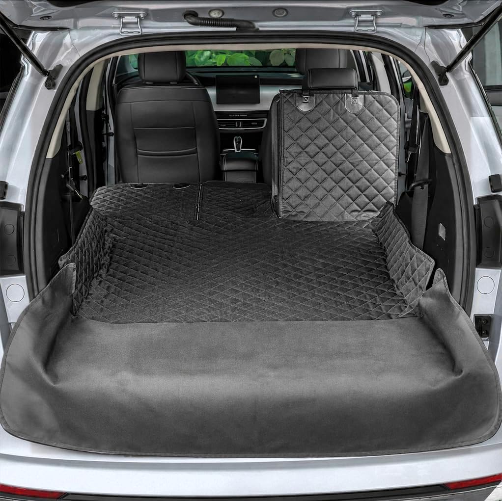 Black non-slip dog trunk mat covering an SUV cargo area and bumper