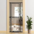 Black-framed 73.6 inch clear acrylic extra tall cat gate in a doorway