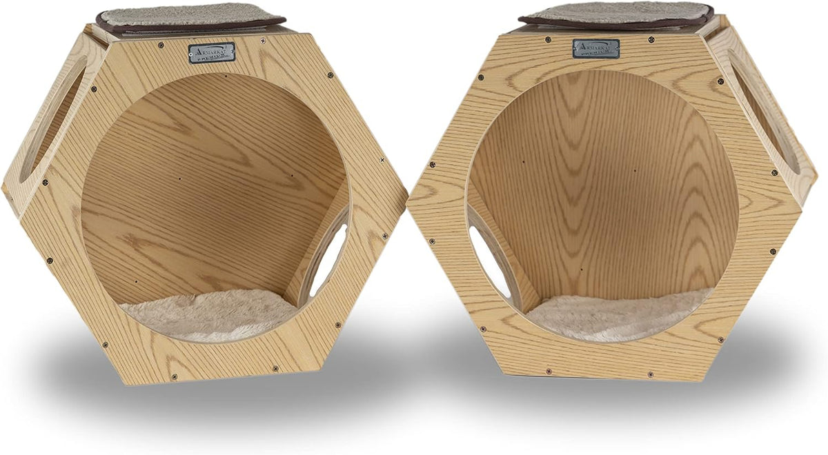Two natural wood wall-mounted cat climbing additions